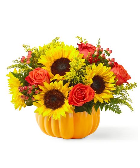 classic sunflowers and orange roses in pumpkin shaped container