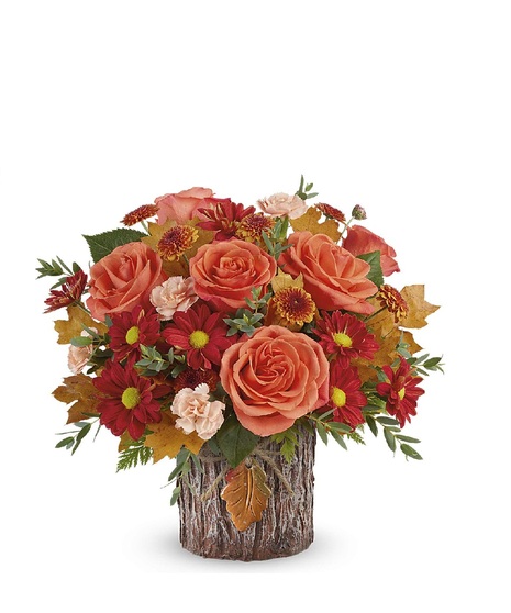 harvest toned flowers in copper vase